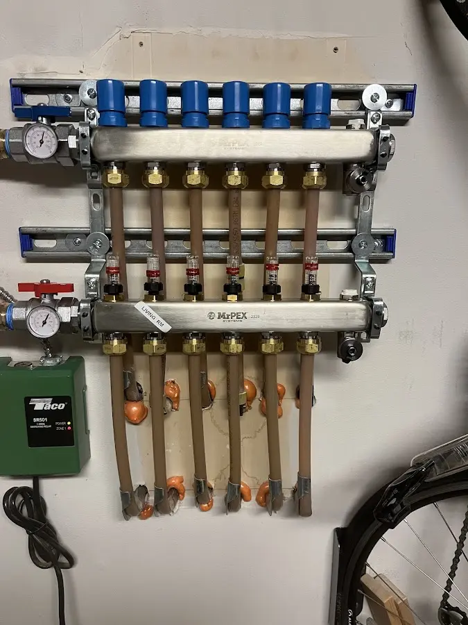 Plumber performing Leak Detection at a residential property in McLean